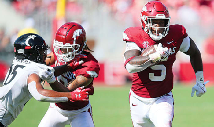 Arkansas running back Raheim Sanders gets block from Jadon Haselwood.